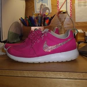 Pink bedazzled Nike Roshes
